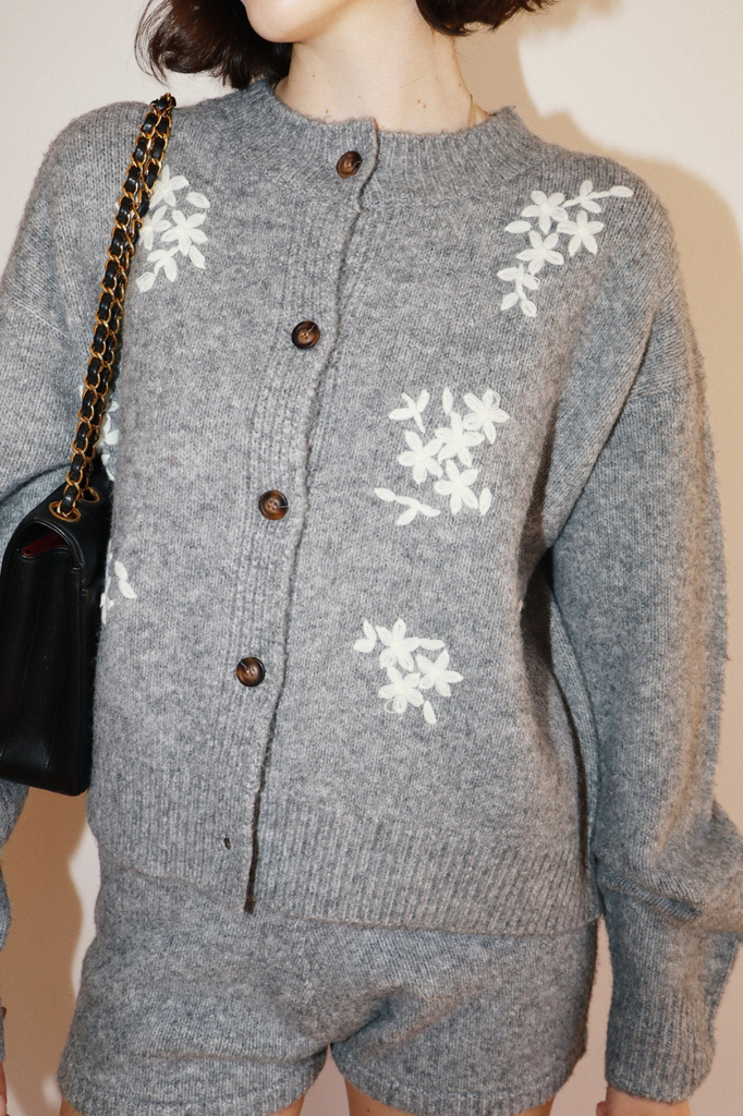 Grey wool cardigan with white floral embroidery motif