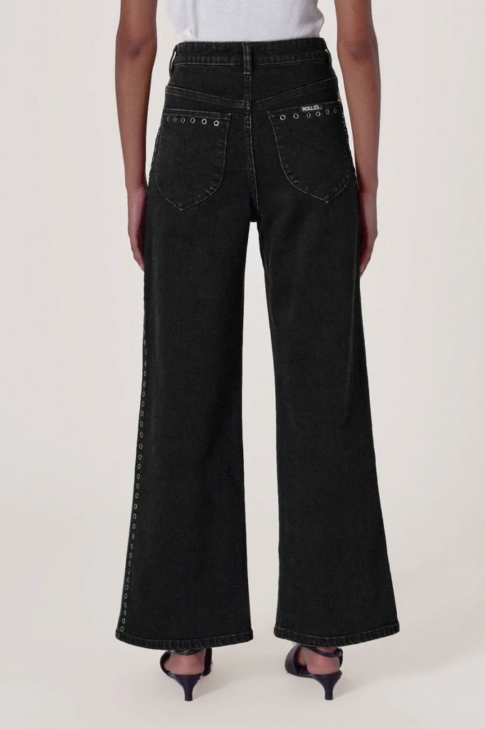 Washed black denim jeans with eyelet detailing
