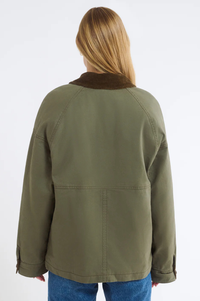 Green cotton barn jacket with brown corduroy collar and cuffs.