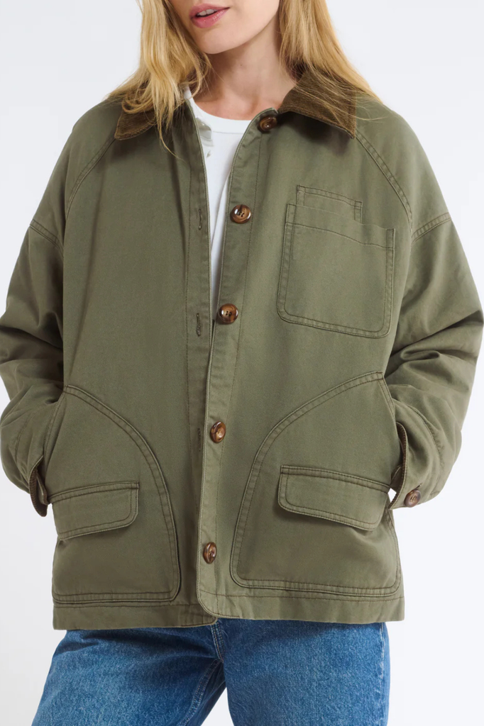 Green cotton barn jacket with brown corduroy collar and cuffs.