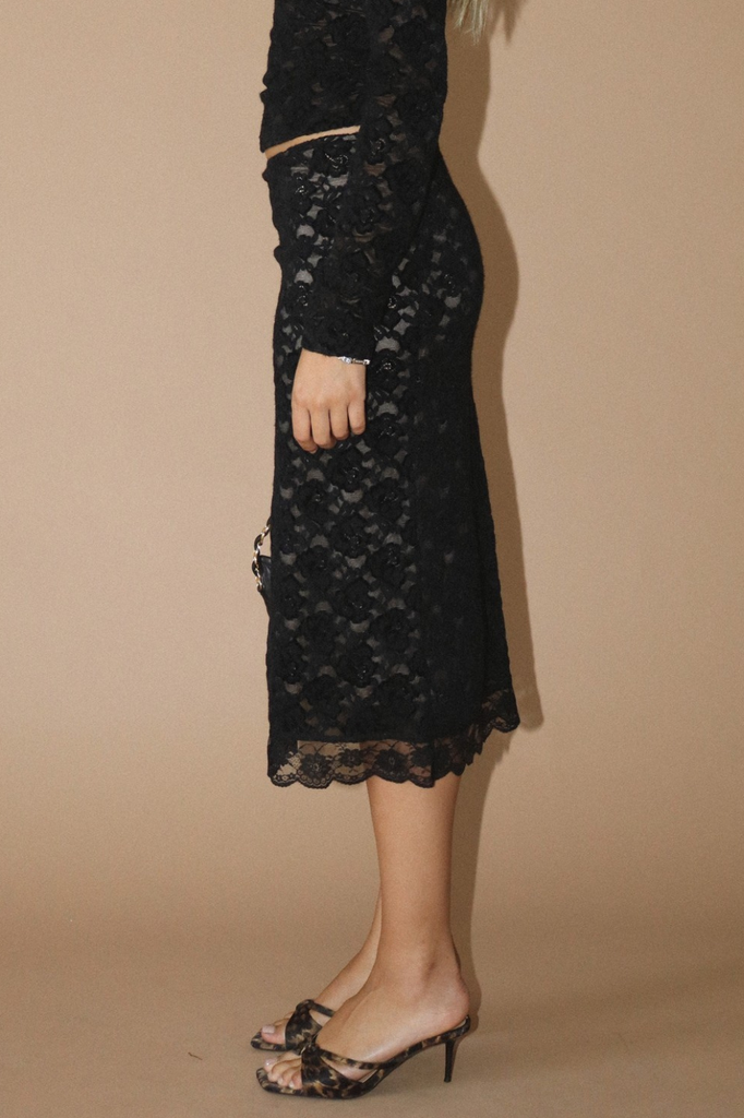 Black floral stretch lace midi skirt with a high front-right slit