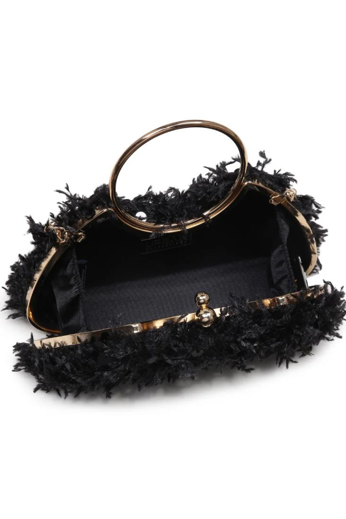 Black evening bag adorned with feathers and sequins