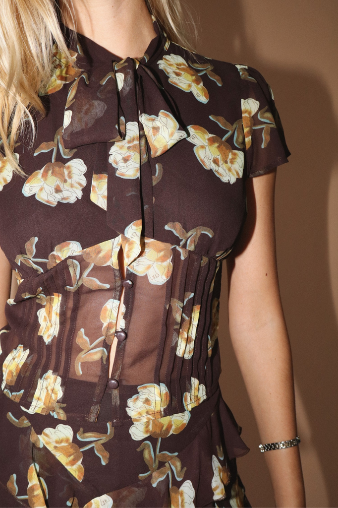 Chocolate brown floral corset style blouse with tie accent at neck