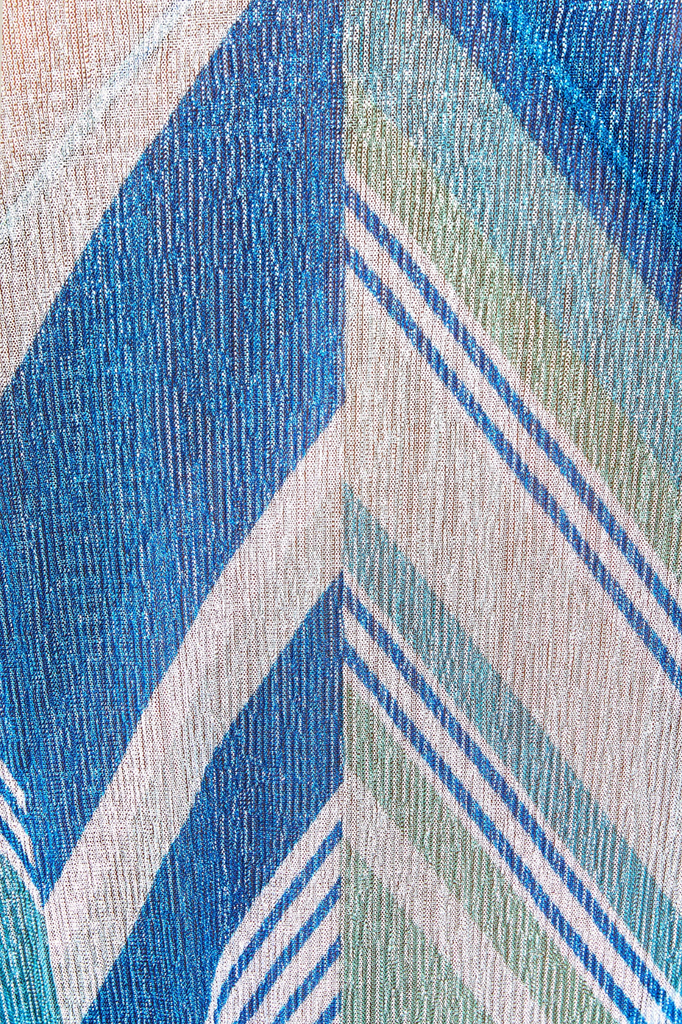 Shimmery tonal blue sarong with fringe along the hem