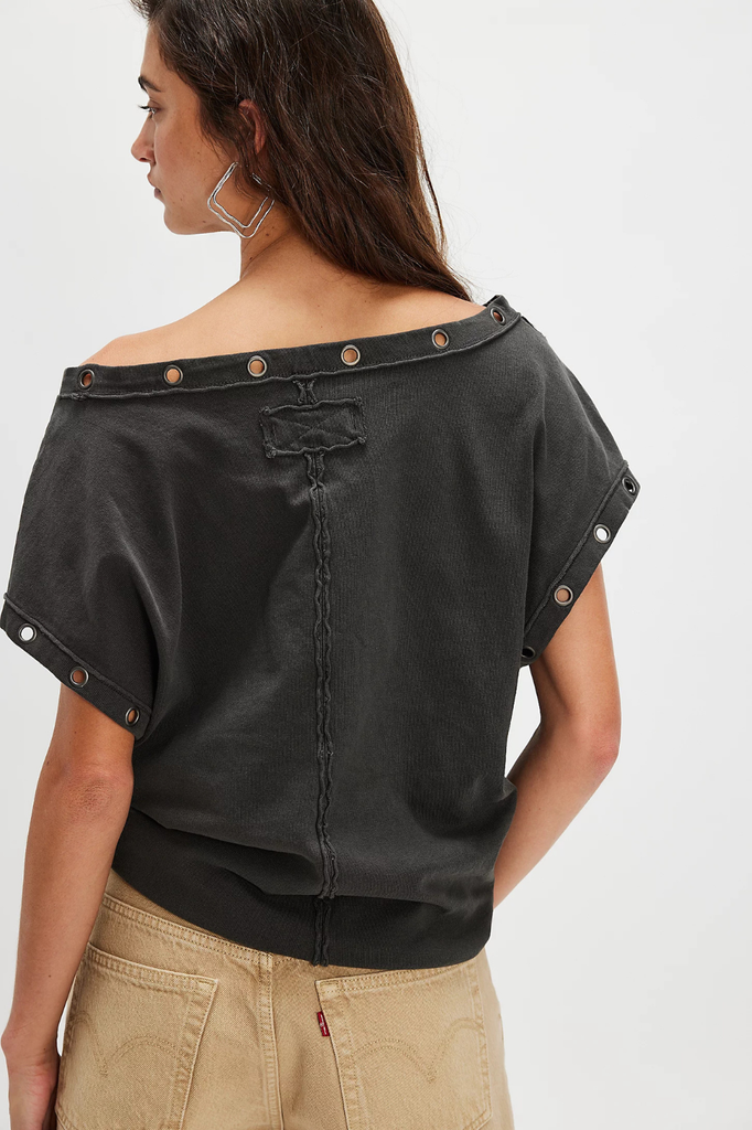 Vintage faded black off-the-shoulder tee with grommet embellishments