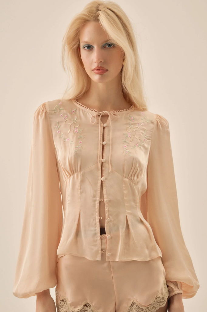 Vintage-inspired satin blouse with dainty floral embroidery