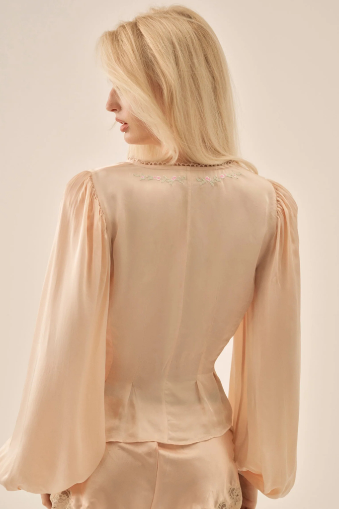 Vintage-inspired satin blouse with dainty floral embroidery