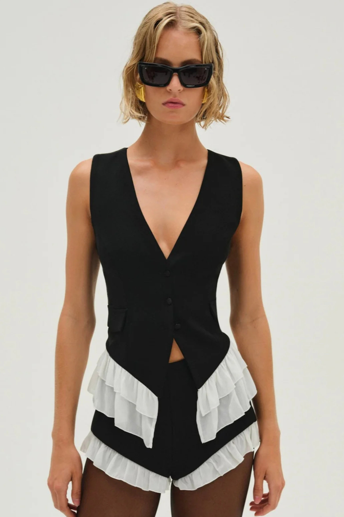Chiffon ruffle trimmed shorts in a black suiting fabric