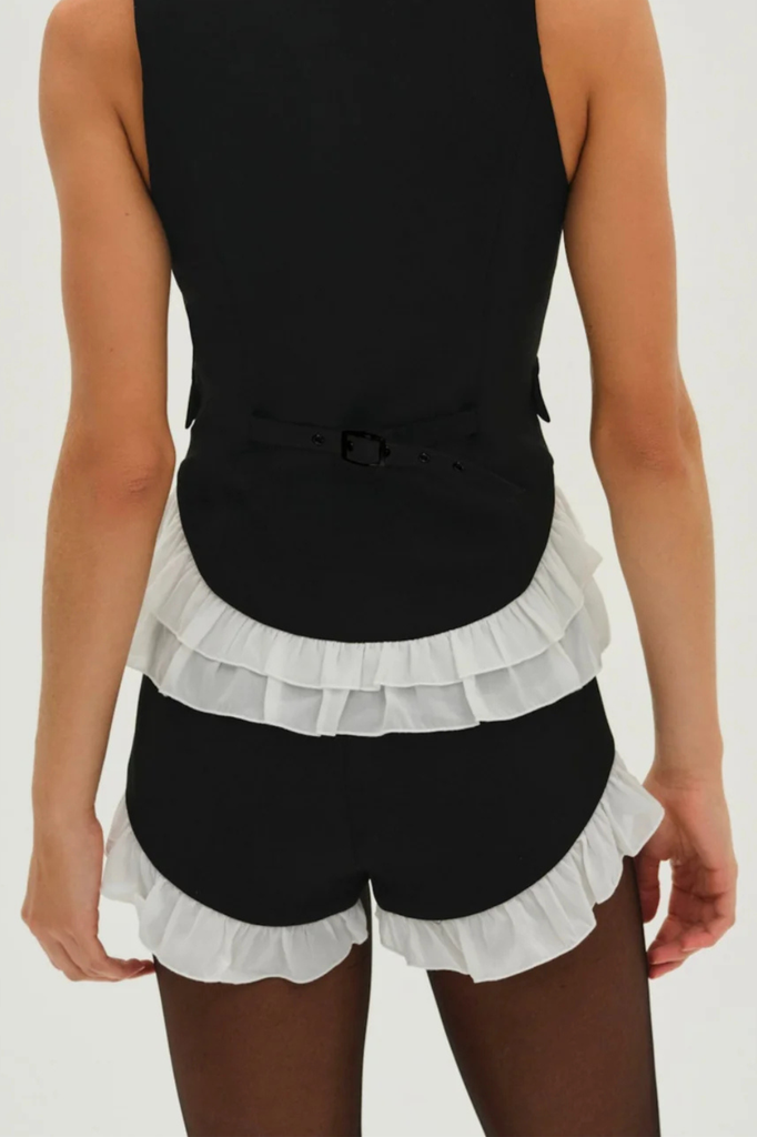 Chiffon ruffle trimmed shorts in a black suiting fabric