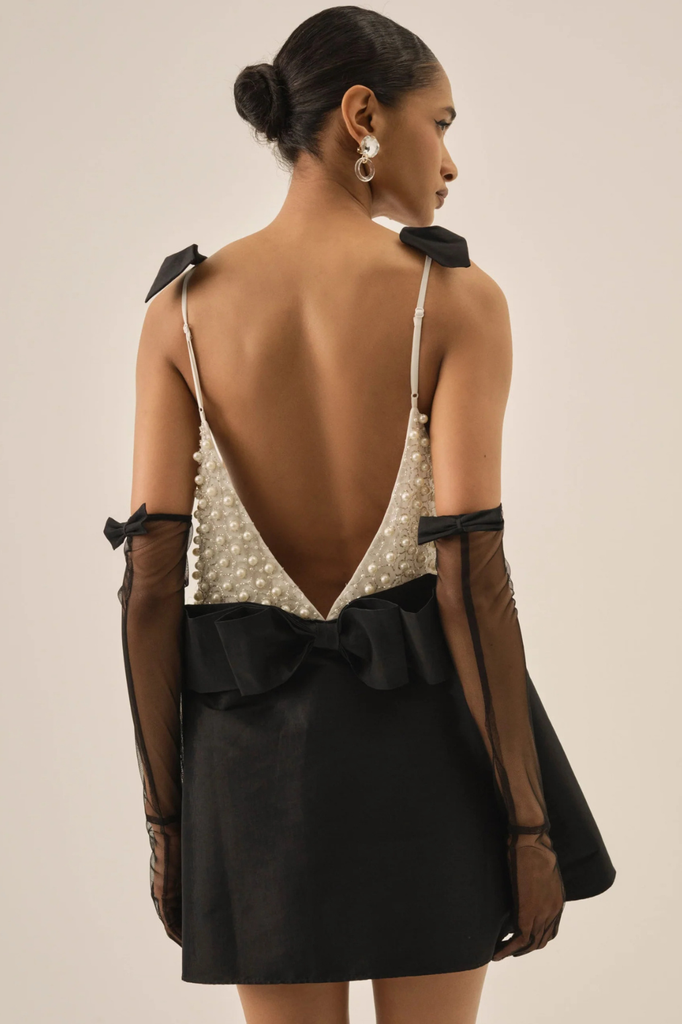 Black and white little mini dress embellished with pearls