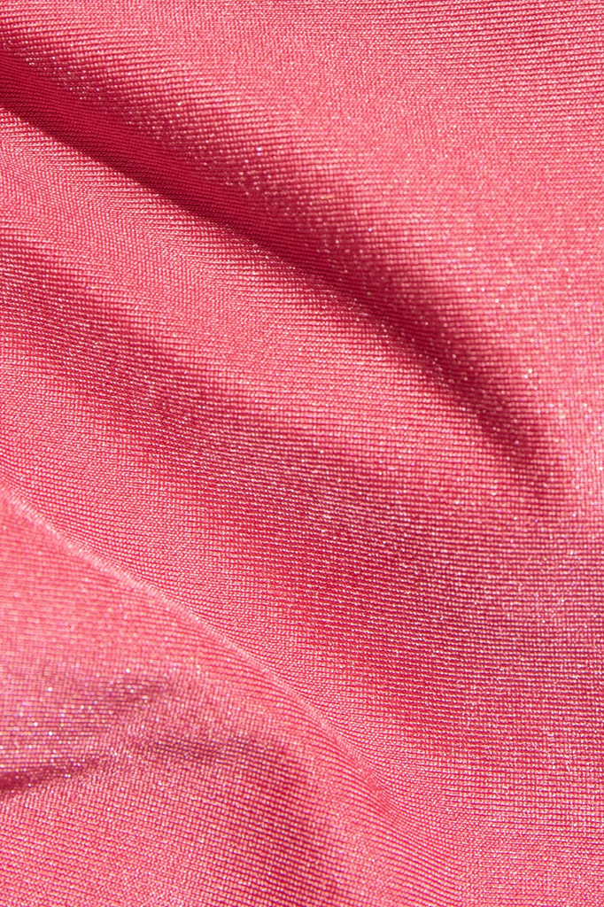 Pink satin bikini top with a hammered gold ring at center bust.&nbsp;