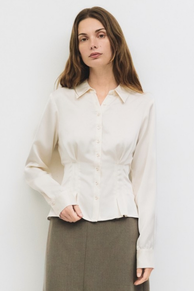 Cream button-down womens blouse with pleats and tapered waist