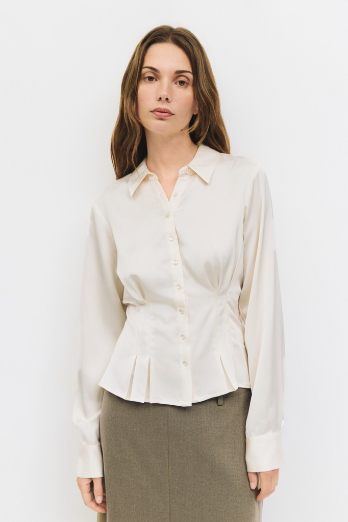 Cream button-down womens blouse with pleats and tapered waist