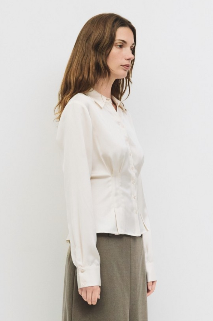 Cream button-down womens blouse with pleats and tapered waist