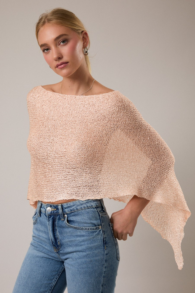Loose knit light peach poncho with micro sequins