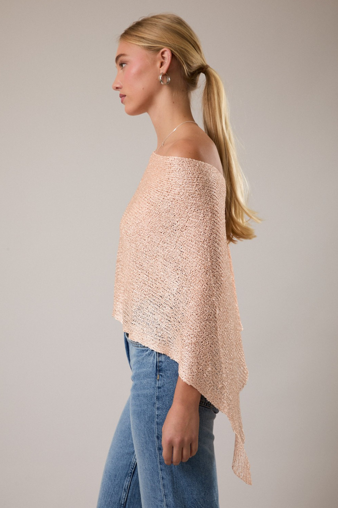 Loose knit light peach poncho with micro sequins