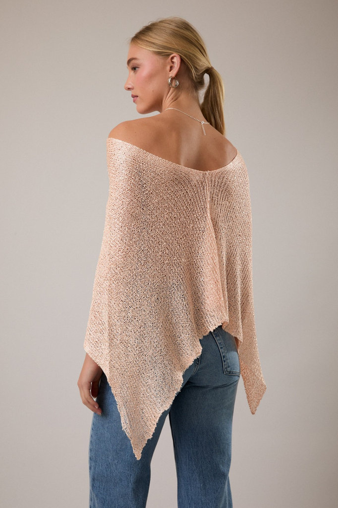 Loose knit light peach poncho with micro sequins