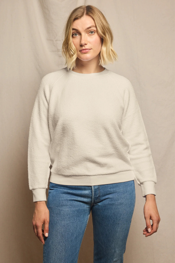 Inside out fleece sweatshirt with exposed raglan seaming