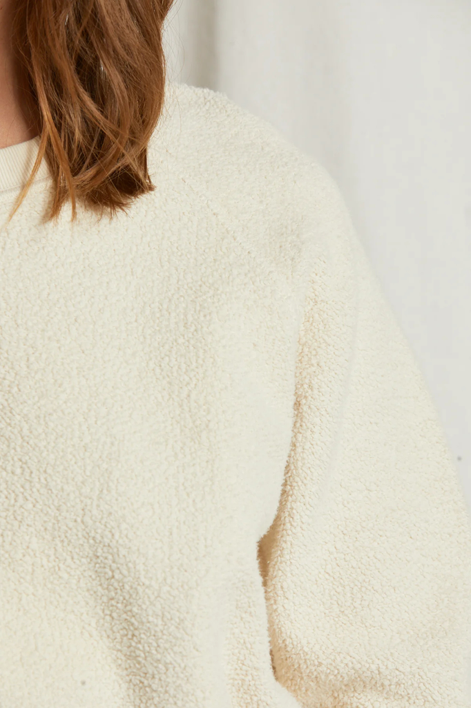 Inside out fleece sweatshirt with exposed raglan seaming