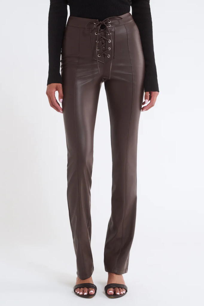 Dark brown pants in a stretchy, fitted faux leather