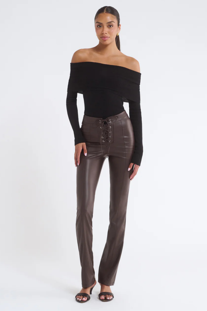 Dark brown pants in a stretchy, fitted faux leather