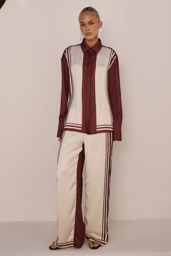Mid rise satiny burgundy and cream pants