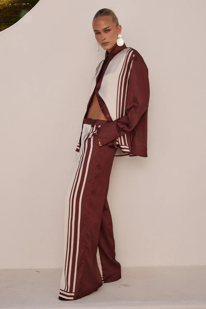 Mid rise satiny burgundy and cream pants