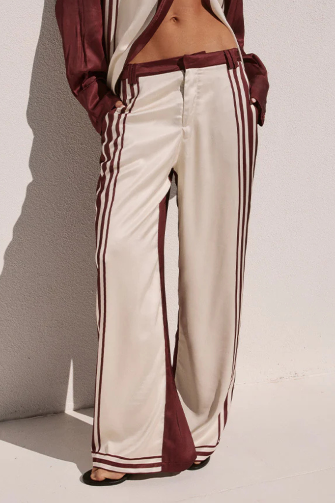 Mid rise satiny burgundy and cream pants