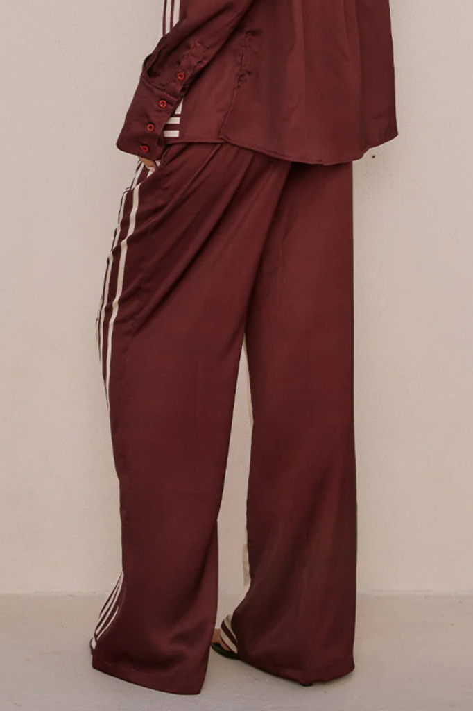 Mid rise satiny burgundy and cream pants