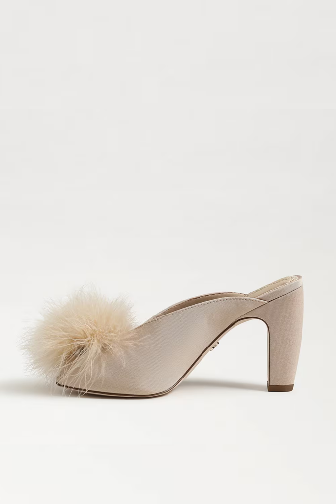 Cute statement dress mule heel with faux fur pompom accent